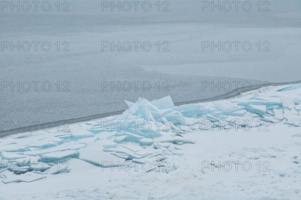 Lake Baikal, Siberia, Russia. Frozen lake caps broken in deep winter reminiscent of a Caspar David Friedrich painting