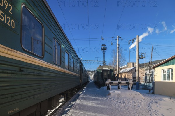 Siberia, Russia. A train station with the Trans Siberian railway on its way to Moscow