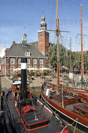 Museum harbour, museum ships, historic scales and the town hall, Leer, East Frisia, Germany