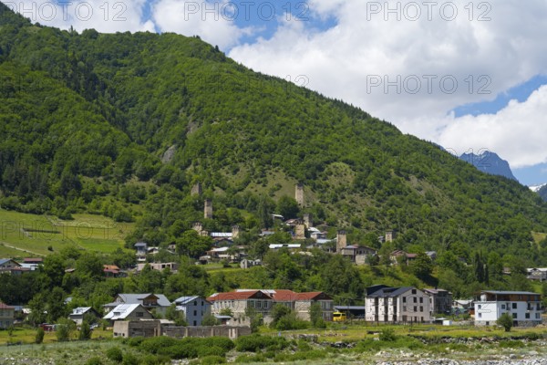 Picturesque village on a mountainside surrounded by lush greenery and mountains, Mestia, Mingrelia and Upper Svaneti, Svaneti, High Caucasus, Georgia