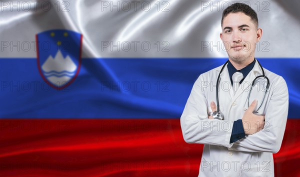 Portrait of medical professional on Slovenia flag background. Slovenian national health system