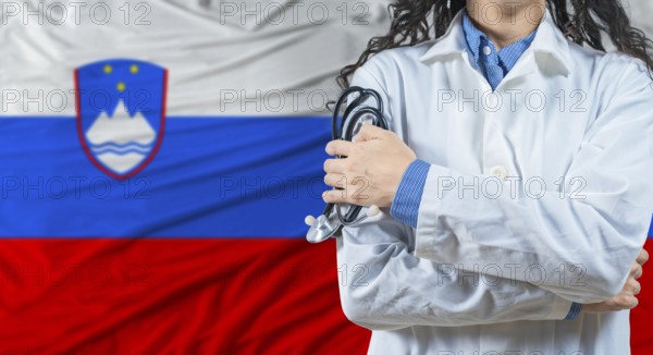 Healthcare professional with Slovenia flag background. Professional doctor holding stethoscope on Slovenia flag background