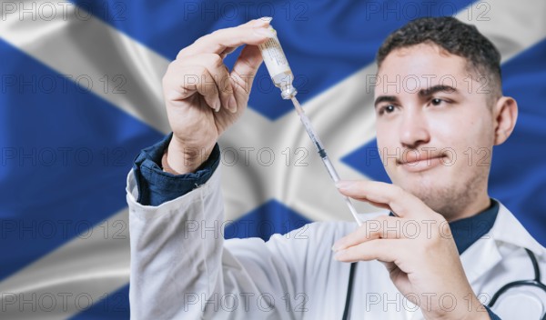 Doctor holding syringe on Scotland flag background. Medical professional holding syringe with Scottish flag in the background