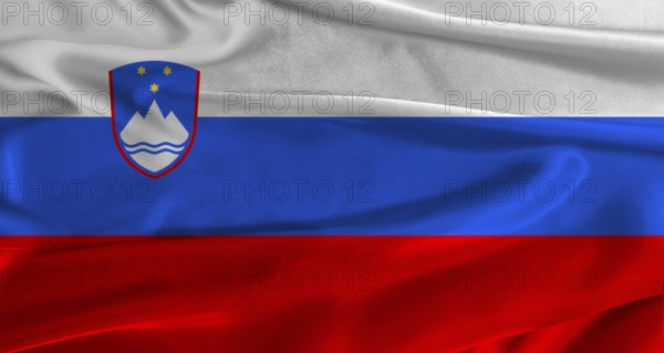 Flag of Slovenia with fabric textured background. Close up of National flag of Slovenia with realistic texture