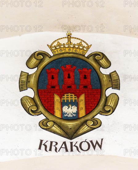 City coat of arms of Krakow, Rynek with Cloth Hall, from 13th century, Main Market Square, landmark of the city, Krakow, Poland
