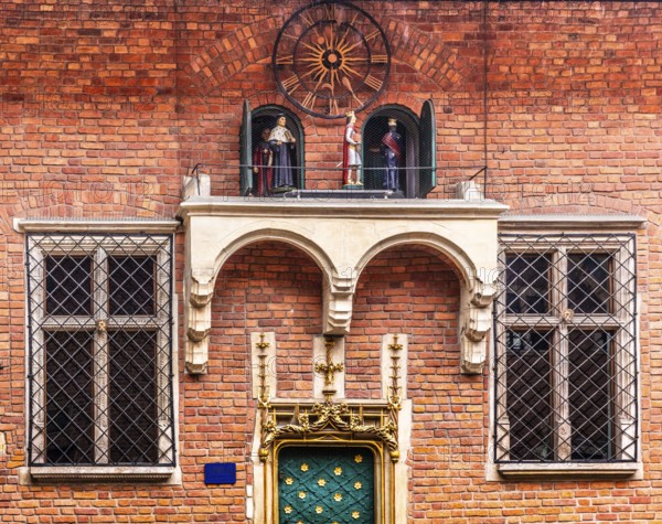 Porta Aurea with music box with moving figures from university history, Collegium Maius oldest building of the Jagellonian University, 1364, Krakow, Poland