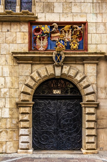 Entrance portal with coat of arms, Collegium Maius oldest building of the Jagellonian University, 1364, Krakow, Poland
