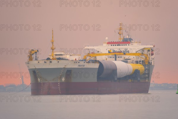 A semi-submersible ship is towed from the Weser to the North Sea, Bremerhaven, Bremen, Germany