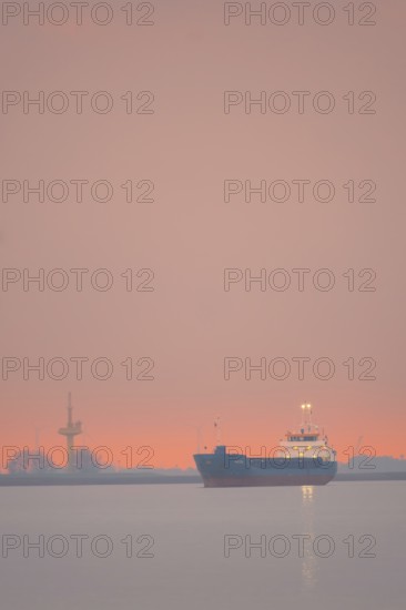 View of a ship on the Weser at sunset, Bremerhaven, Bremen, Germany