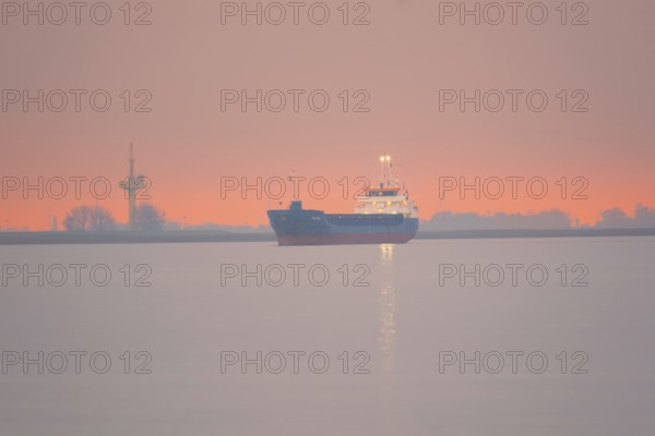 View of a ship on the Weser at sunset, Bremerhaven, Bremen, Germany