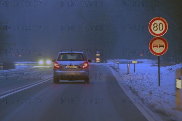 Cars during night snow flurries on B2, Nuremberg, Middle Franconia, Bavaria, Germany