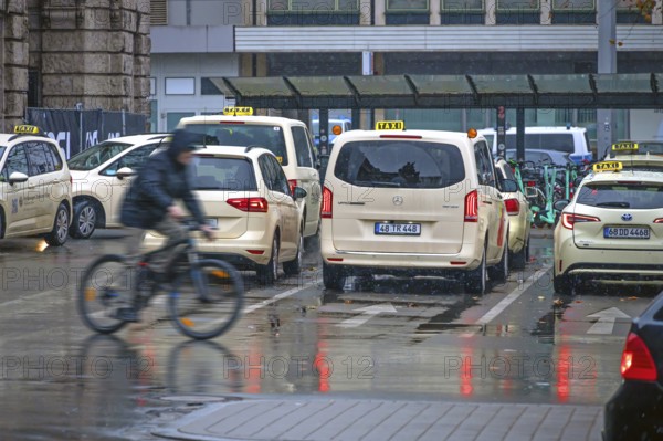 Waiting taxis at the train station in Regen, Nuremberg, Middle Franconia, Bavaria, Germany