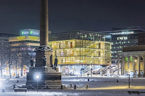 Winter in Stuttgart. It snowed overnight and the city is wintry white early in the morning. Palace Square with art museum. Stuttgart, Baden-Württemberg, Germany