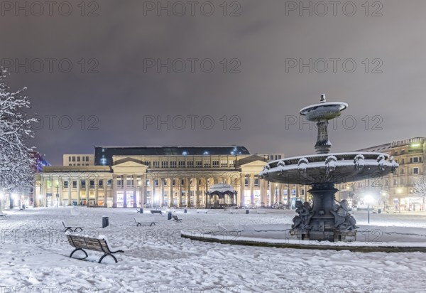 Winter in Stuttgart. It snowed overnight and the city is wintry white early in the morning. Palace Square with Royal Building. Stuttgart, Baden-Württemberg, Germany
