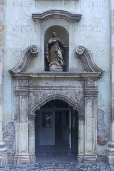Entrance portal of the Baroque Franciscan Church, 1727, Cluj-Napoca, Transylvania, Romania