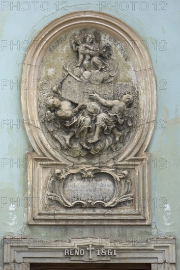 Religious relief from 1861 at the Baroque Franciscan Church, Cluj-Napoca, Romania