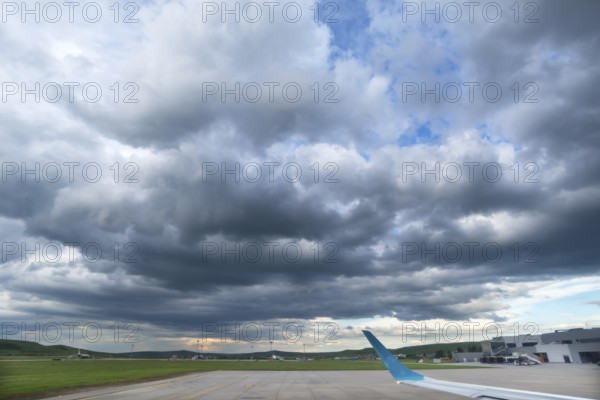 Rain clouds (Nimbostratus) over the airport of Cluj-Napoca, Transylvania, Romania