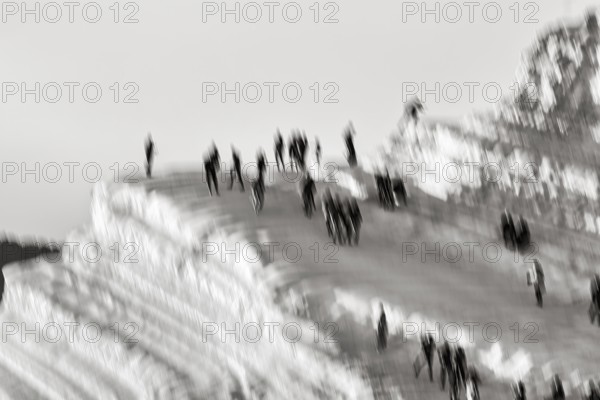Terraced chalk cliffs Scala dei Turchi, anonymous walkers on Turkish steps, illustration, monochrome, motion blur, Realmonte, Agrigento, Sicily, south coast, Mediterranean, Italy