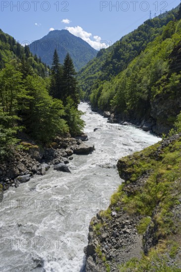 Wide river in the midst of mountainous landscape, Enguri River near Khaishi, Mingrelia and Upper Svaneti region, Georgia