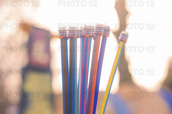 Colourful pipes rise up towards the sky in sunlight in a contrasting open-air environment, fibreglass groundbreaking, Freudenstadt, Germany