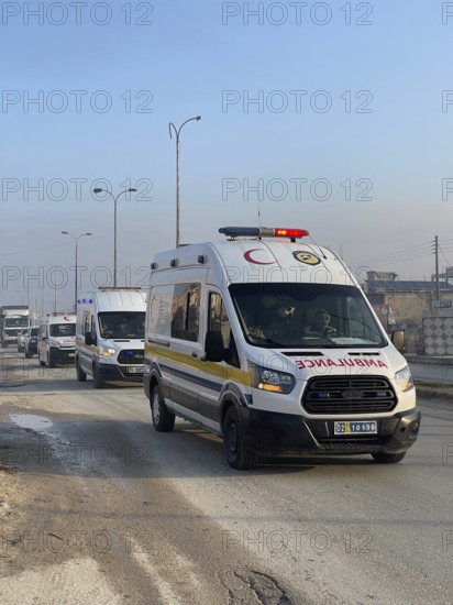 In Aleppo, Syria on January 25, 2026, a 24-vehicle humanitarian aid convoy, carrying UN relief items, departs for Ayn al-Arab. The mission follows a 15-day extension of the temporary ceasefire between the Syrian government and the YPG, Aleppo, Ayn al-Arab, Syria