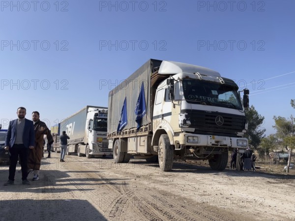 In Aleppo, Syria on January 25, 2026, a 24-vehicle humanitarian aid convoy, carrying UN relief items, departs for Ayn al-Arab. The mission follows a 15-day extension of the temporary ceasefire between the Syrian government and the YPG, Aleppo, Ayn al-Arab, Syria
