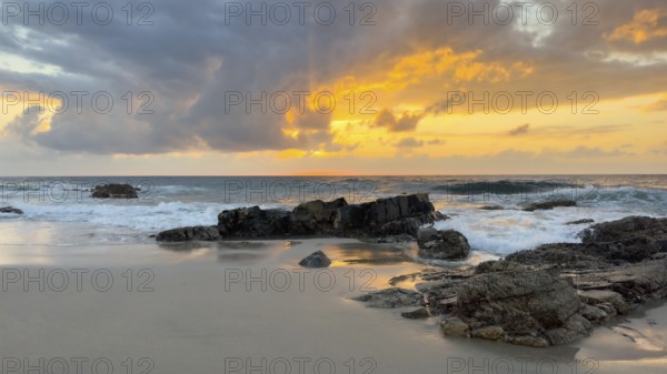 Sunrise on the beach, coast near Sadah, Oman