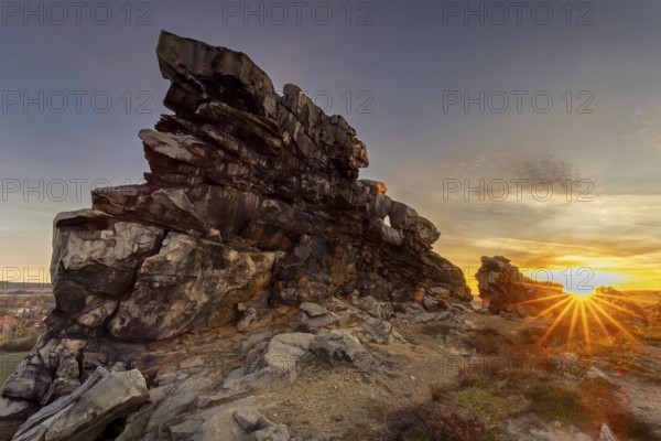 Teufelsmauer, Devil's Wall at sunrise, eroded sandstone rock formation Mittelsteine near Weddersleben in the Harz Mountains, Saxony-Anhalt, Germany