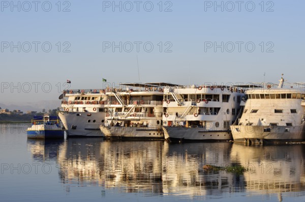 Nile cruise ships at a shipping pier, Luxor, Egypt