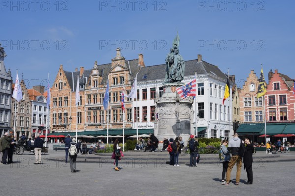 Market square Grote Markt with Jan Breydel and Pieter de Coninck monument and guild houses, Bruges, West Flanders, Flanders, Belgium