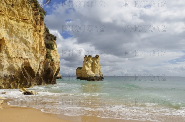 Rocky coast and beach, Praia do Pinhao, Lagos, Algarve, Portugal