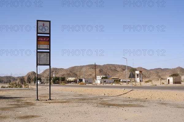 Gas station sign in an oasis in the Arabian Desert, Egypt