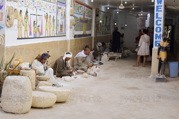 Workers and tourists in an alabaster factory, Luxor, Egypt