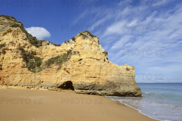 Rocky coast and beach, Praia do Pinhao, Lagos, Algarve, Portugal