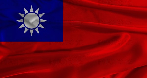 Flag of Taiwan with fabric textured background. Close up of National flag of Taiwan with realistic texture