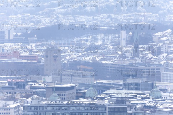 March 18, 2018, winter view with snow toward city center with station and tower from Mount Scherbelino, Stuttgart, Baden-Württemberg, Germany