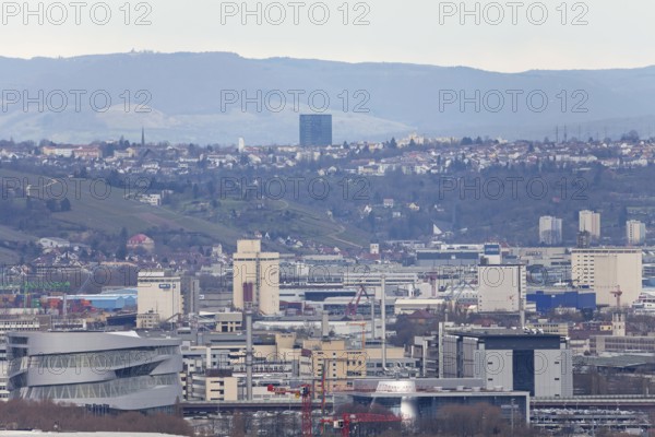 30.03.2018: Zoomed view of city roofs, towers and industrial buildings. Stuttgart, Baden-Wuerttemberg, Germany