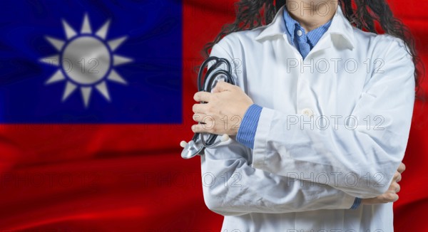 Healthcare professional with Taiwan flag background. Professional doctor holding stethoscope on Taiwan flag background