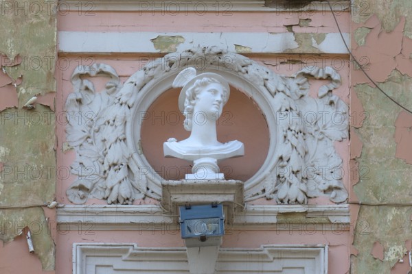 Bust of Hermes on a dilapidated 19th century house façade, Czernowicz, Ukraine