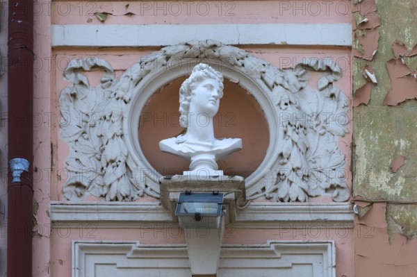 Bust on a dilapidated 19th century house façade, Czernowicz, Ukraine