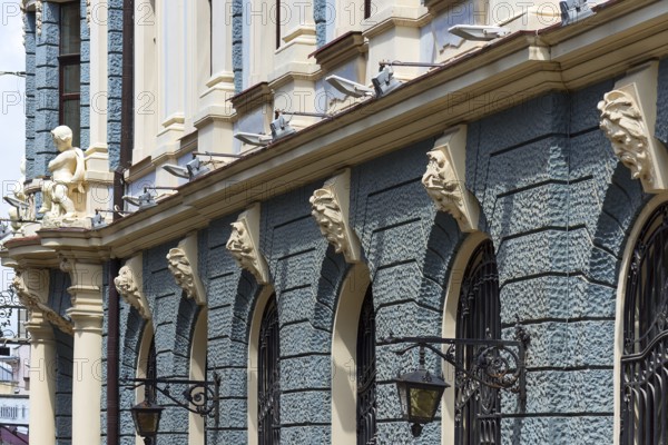 19th century façade, with sculptures above the windows, Czernowicz, Ukraine