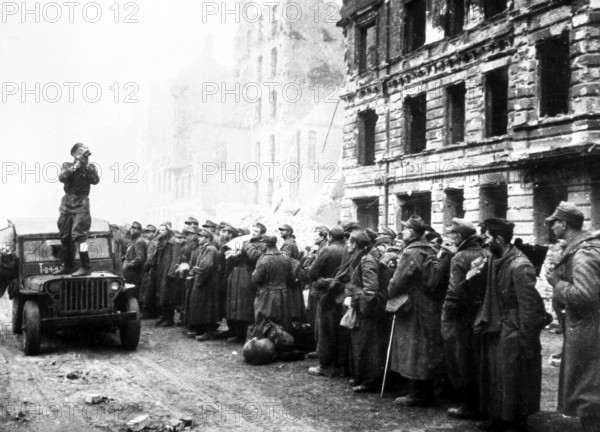A Red Army soldier films German prisoners of war, Berlin at the beginning of May 1945