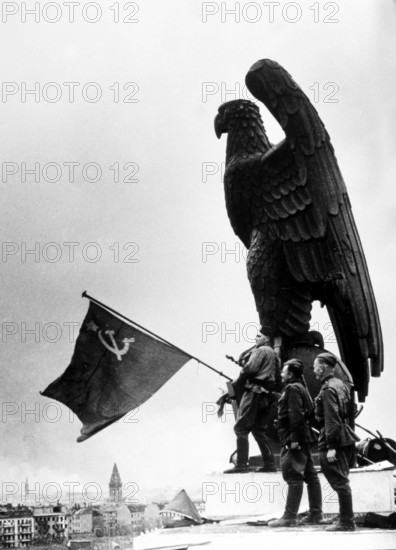 J. Chaldej arrived in Berlin with three Soviet flags. The first flag was raised at Tempelhof Airport. May 2, 1945, Berlin, Germany