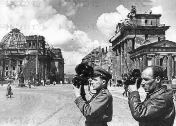 Soviet reporters, journalists with film cameras in front of the Brandenburg Gate, June 1945, Berlin, Germany
