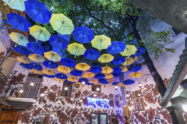 Umbrellas as decoration in a courtyard of a restaurant, Czernowicz, Ukraine