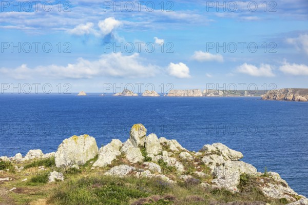 Seascape view with a rocky coastline a beautiful sunny summer day by the sea, Crozon peninsula, Bretagne, France