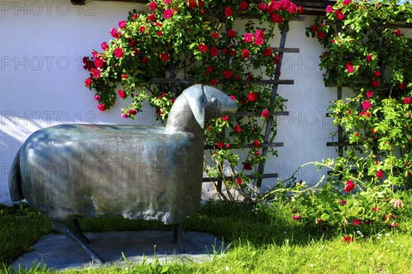Sheep from Heinrich Kirchner, in front of St. Johann Baptist Church, Truchtlaching, Chiemgau, Upper Bavaria, Bavaria, Germany