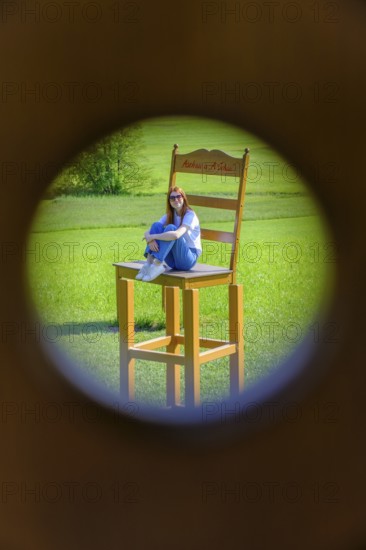 Bank, optical illusion at Café Pauli, Aschau, Chiemgau, Upper Bavaria, Bavaria, Germany