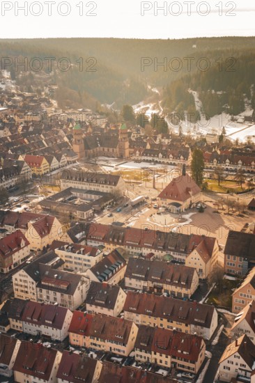 Dense city view with churches and historic buildings, surrounded by forest and mountains, Freudenstadt, Black Forest, Germany