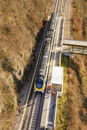 Bird's eye view of a train at a station in an autumn landscape, test trip on the new Hermann-Hesse railway with Siemens Mireo Plus B trains, Calw, Germany